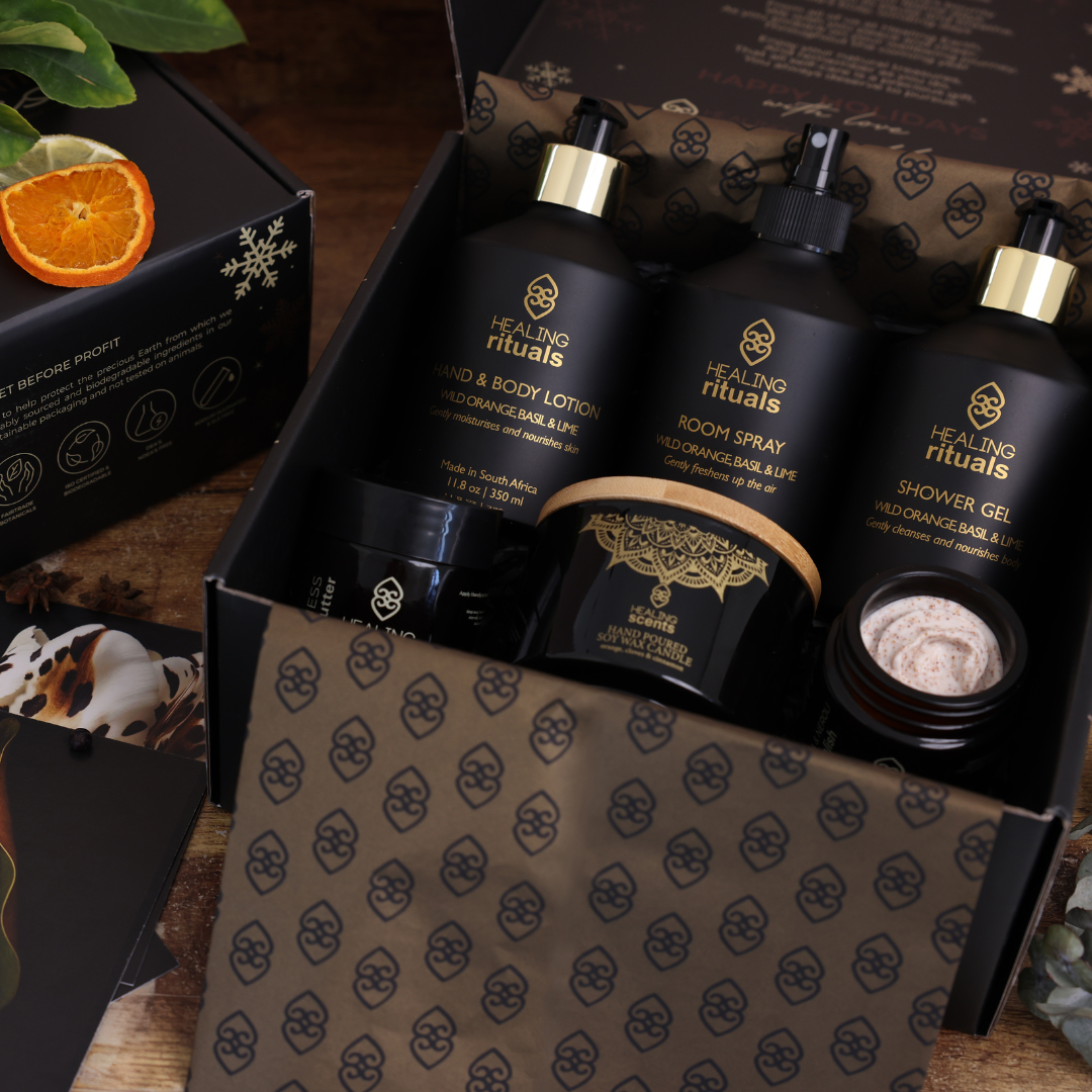 Healing rituals by Healing Earth product set including room spray, shower gel, and lotion in a decorative box.